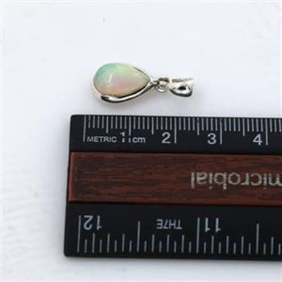 Elegant Teardrop Ethiopian Opal Pendant in 925 Sterling Silver | Akrati Jewels Inc